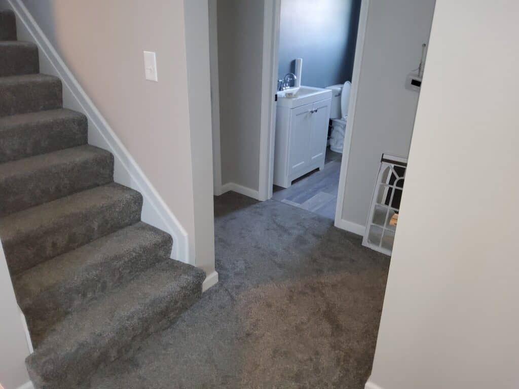 Carpet installed on floors and stairs