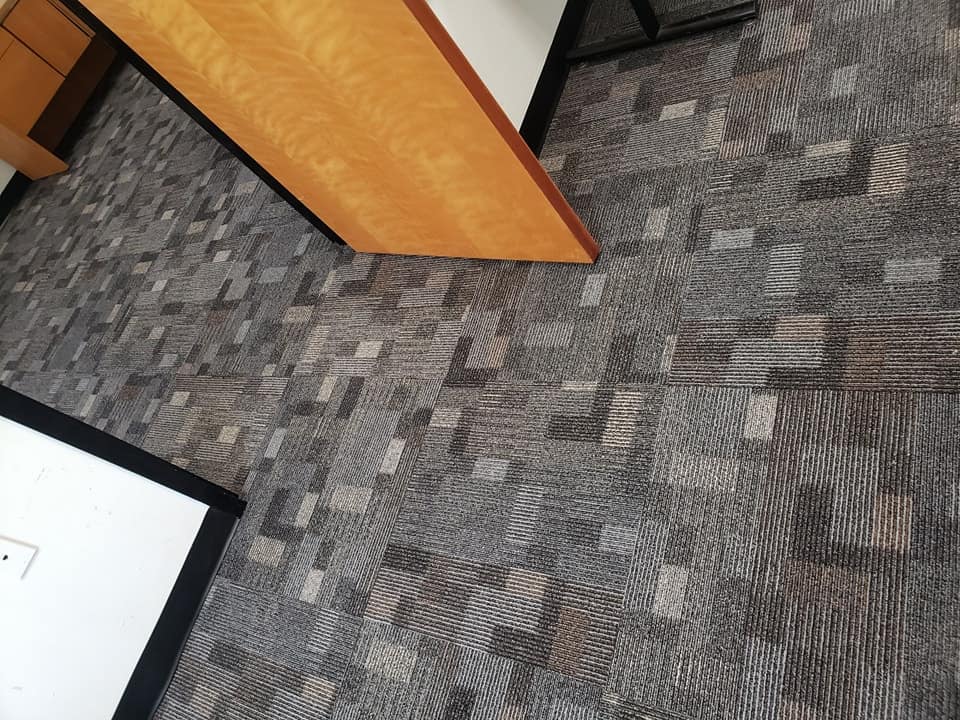 Corporate style carpet installed in an office space